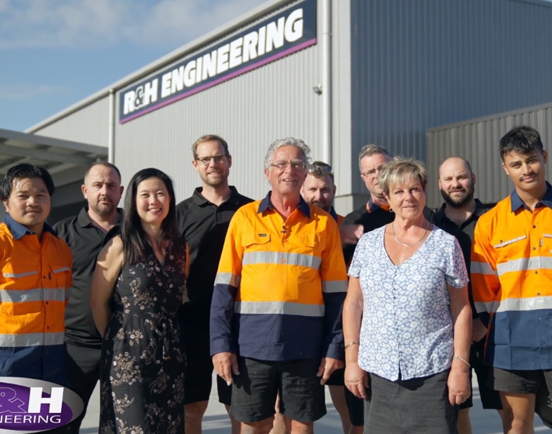 R&H Engineering’s expert team collaborating on a complex project