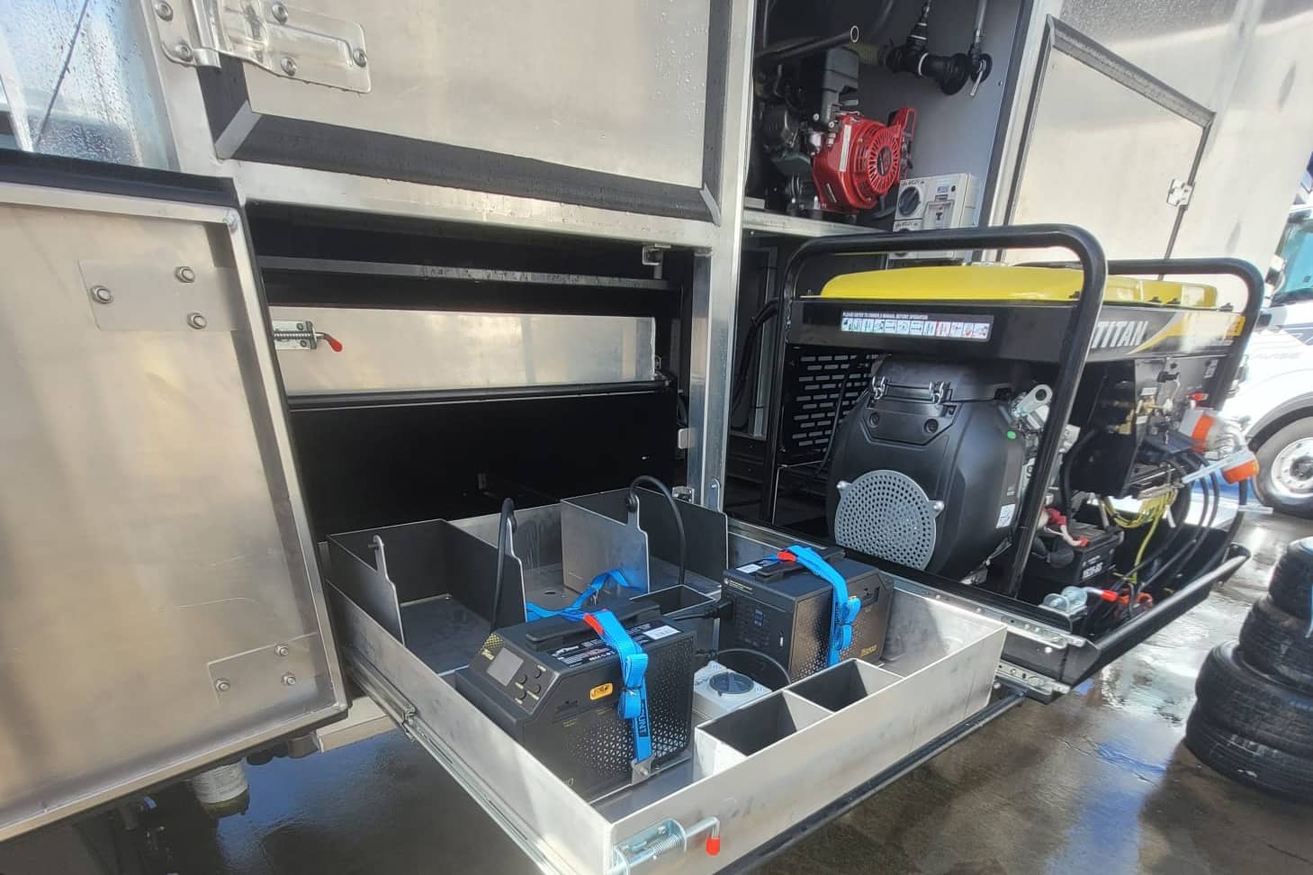 An engineer at R&H Engineering reviewing technical blueprints