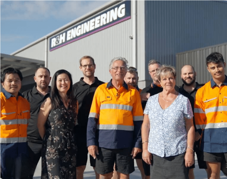 R&H Engineering’s expert team collaborating on a complex project